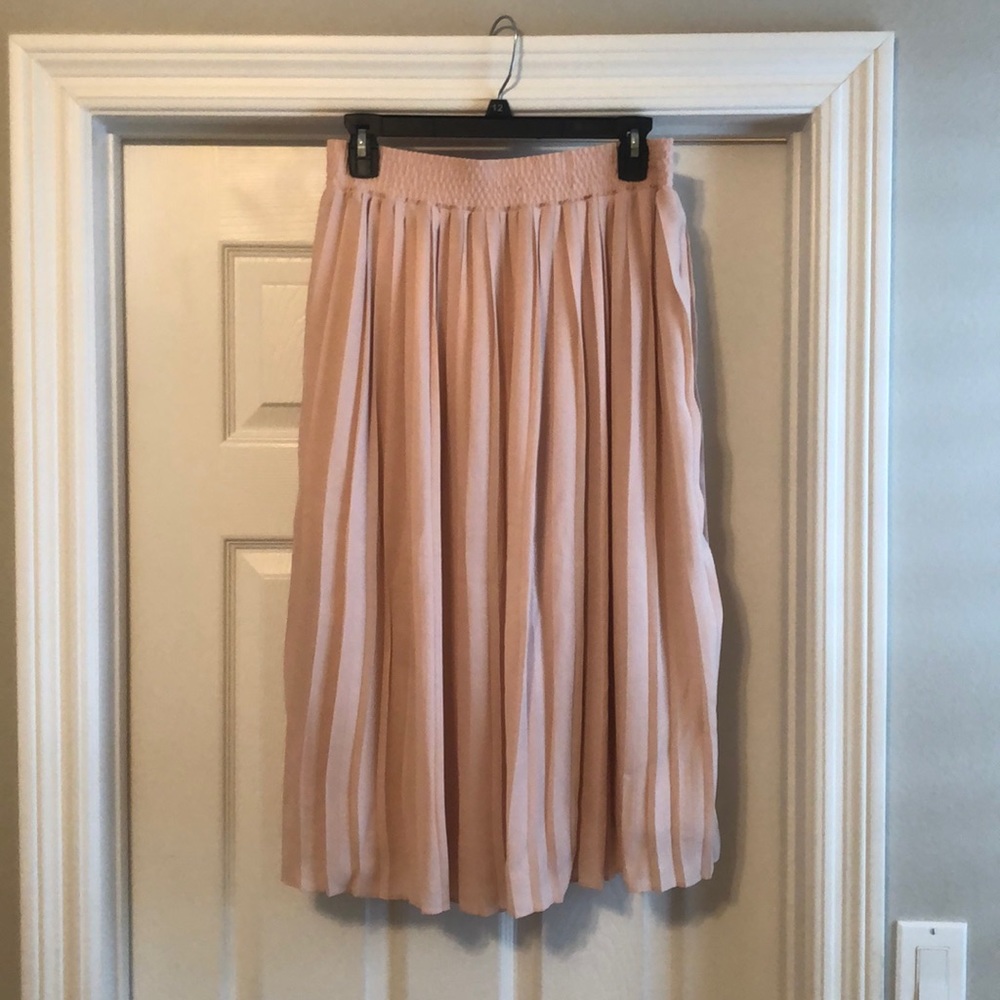 light pink pleated skirt